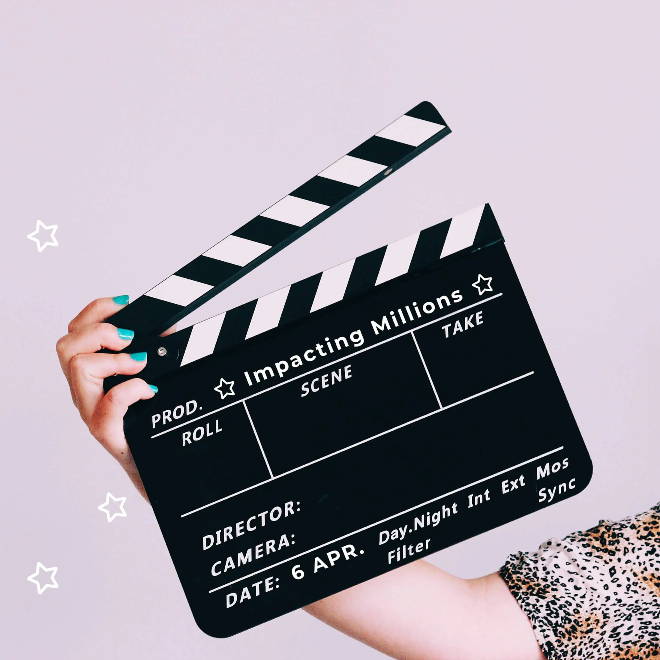 Clapperboard saying Impacting Millions with stars